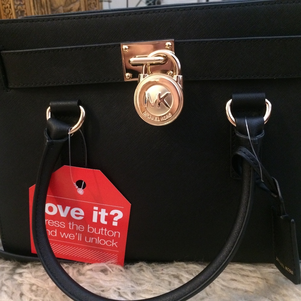 Michael Kors purse with lock- nwt
